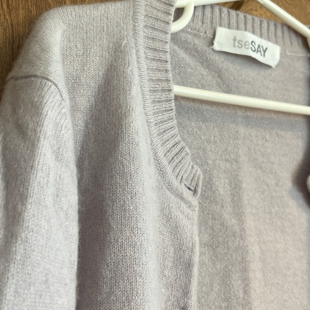 Dusty lavender TSE SAY kids cashmere cardigan I’d say it fits 4 to 6 years old.